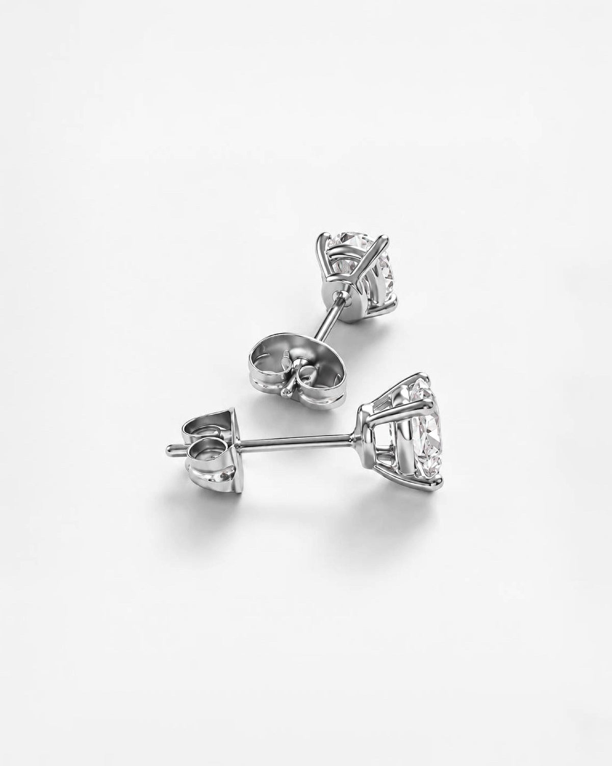 0.7ct oval lab grown diamond rhodium plated alloy studded earrings