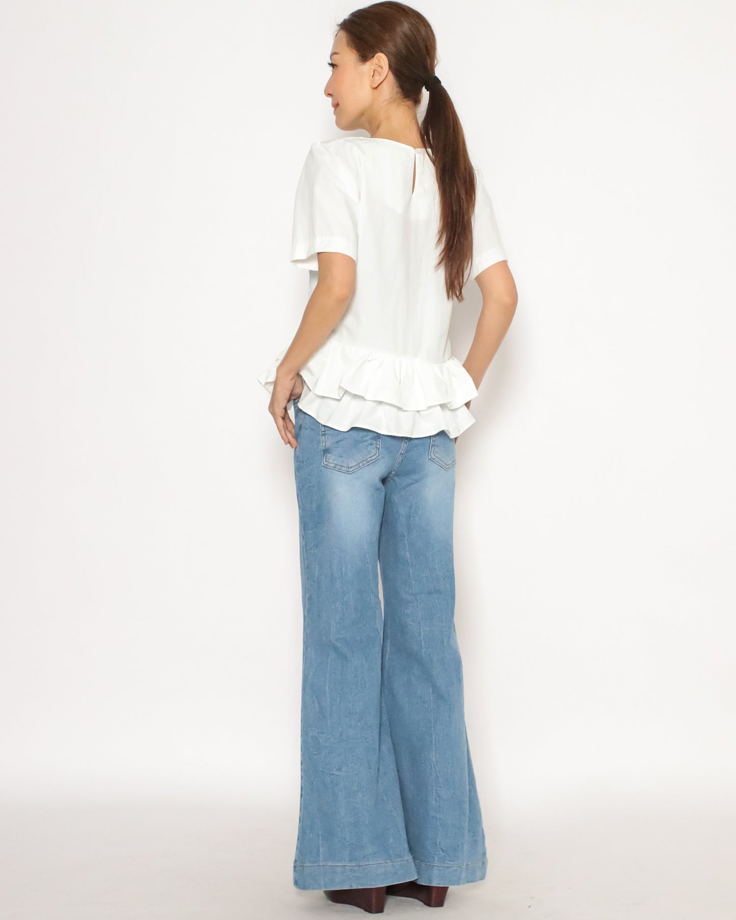 ivory ruffles hem tech top