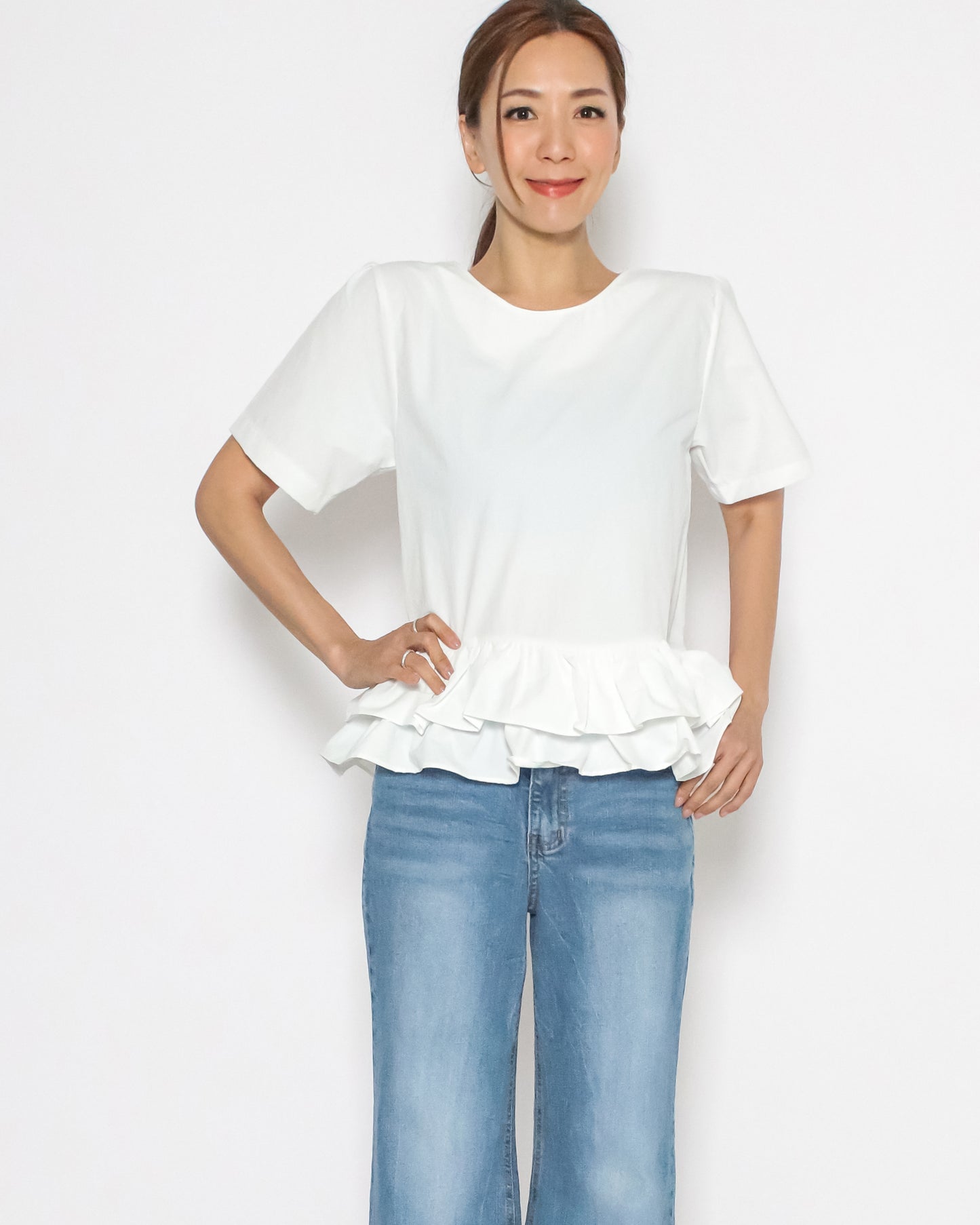 ivory ruffles hem tech top