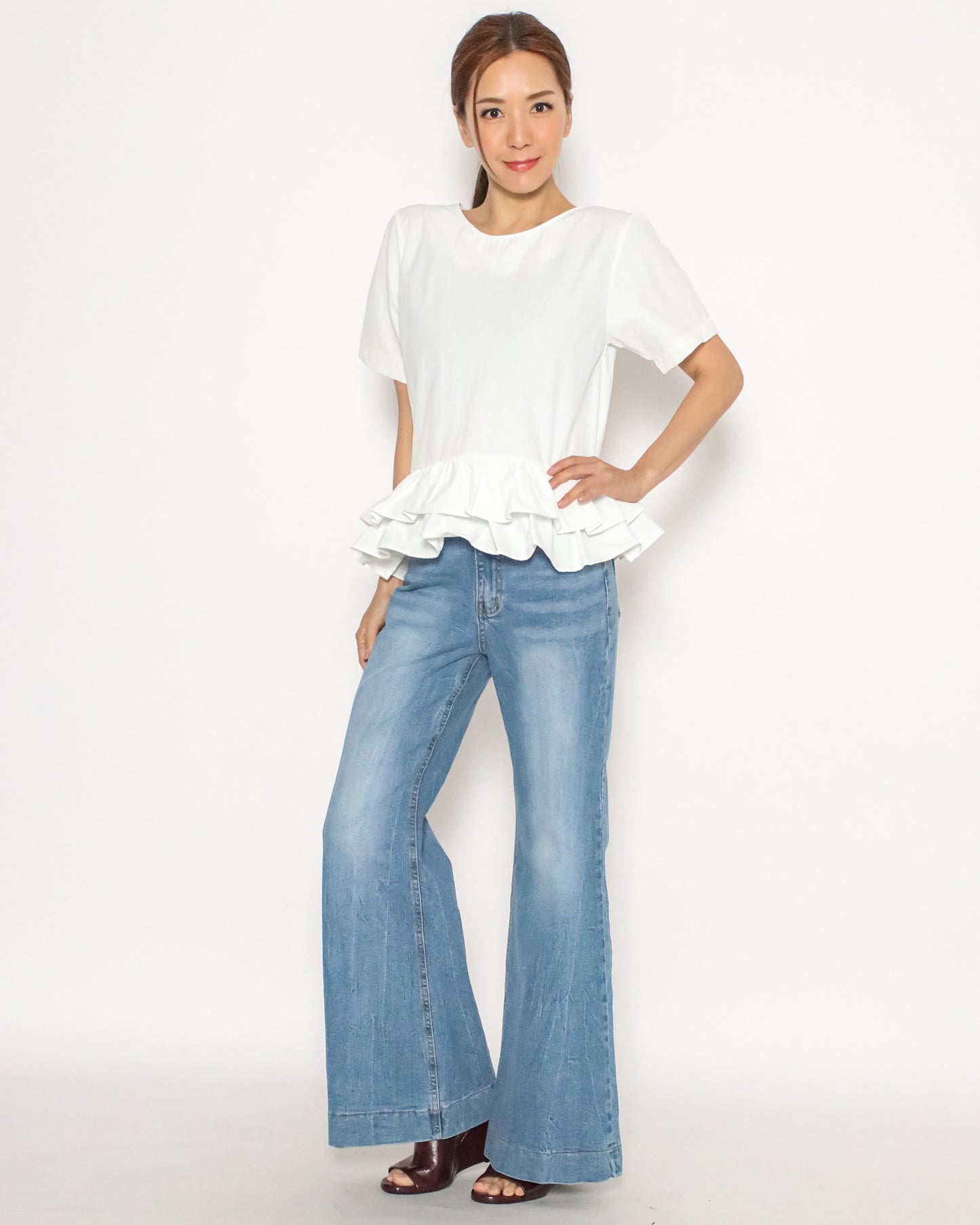 ivory ruffles hem tech top