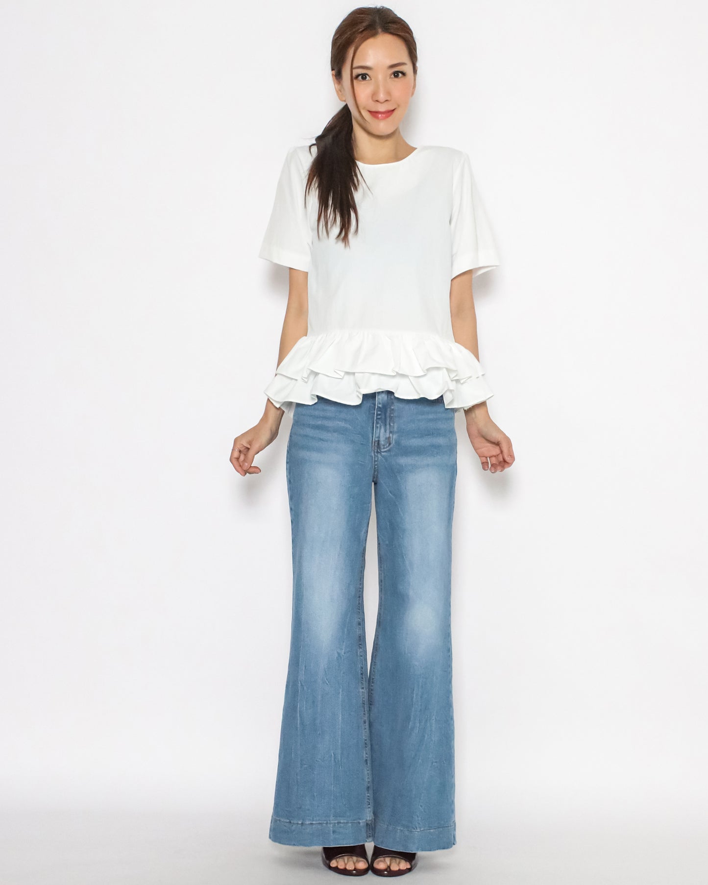ivory ruffles hem tech top