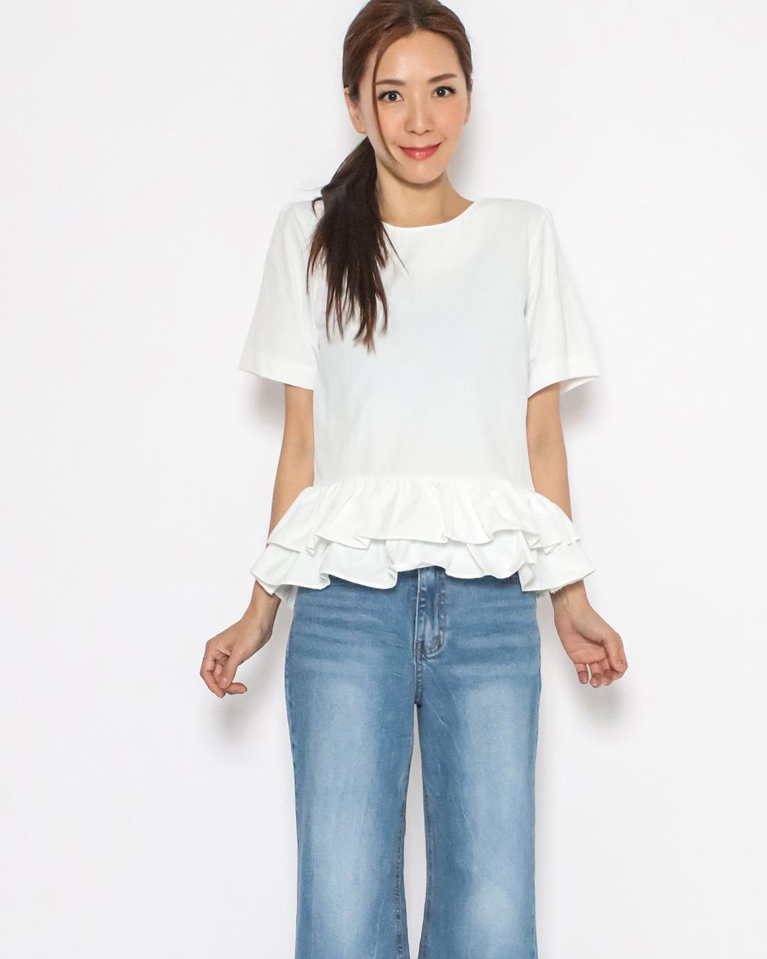 ivory ruffles hem tech top