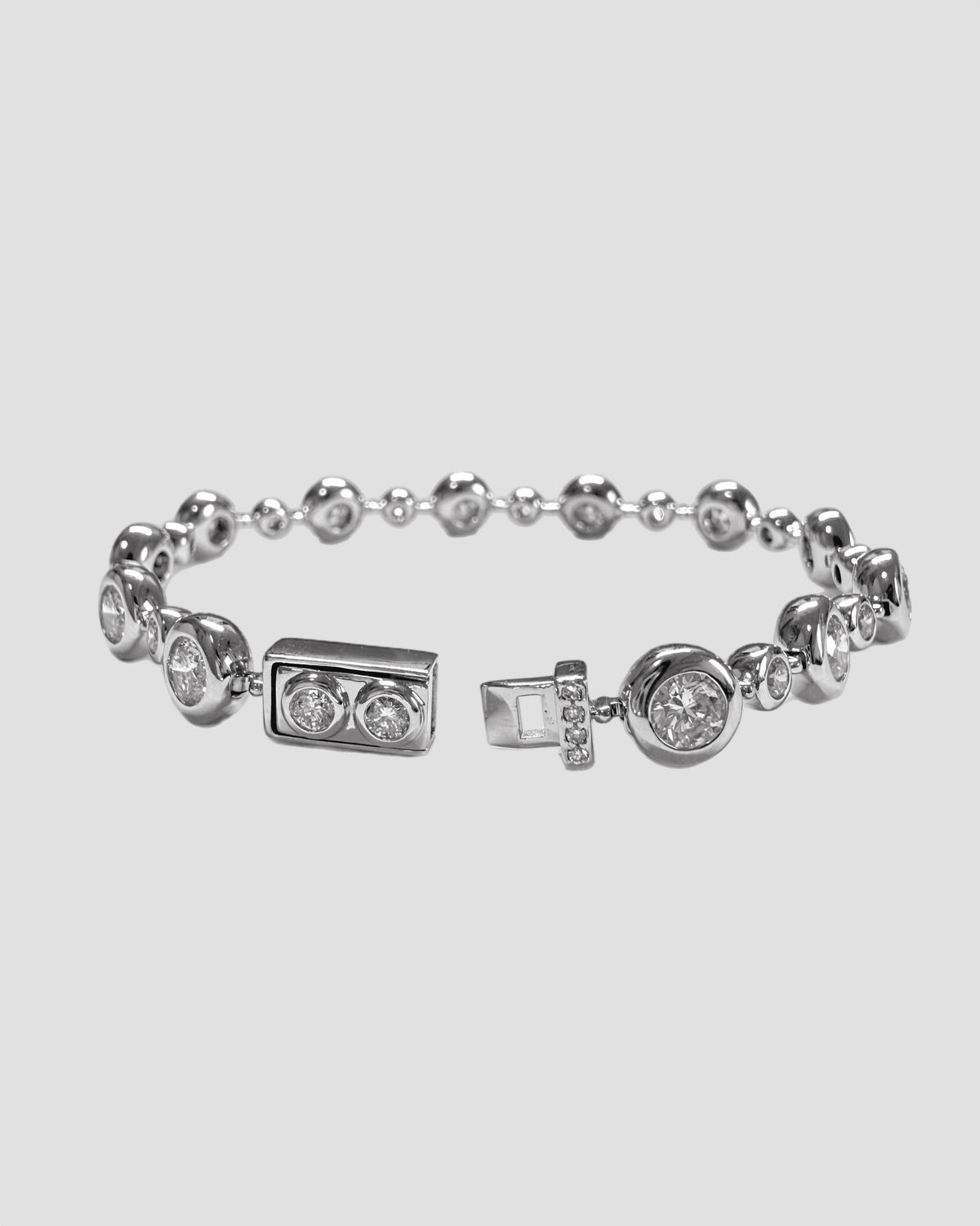 round lab-grown diamond bezel rhodium plated tennis bracelet
