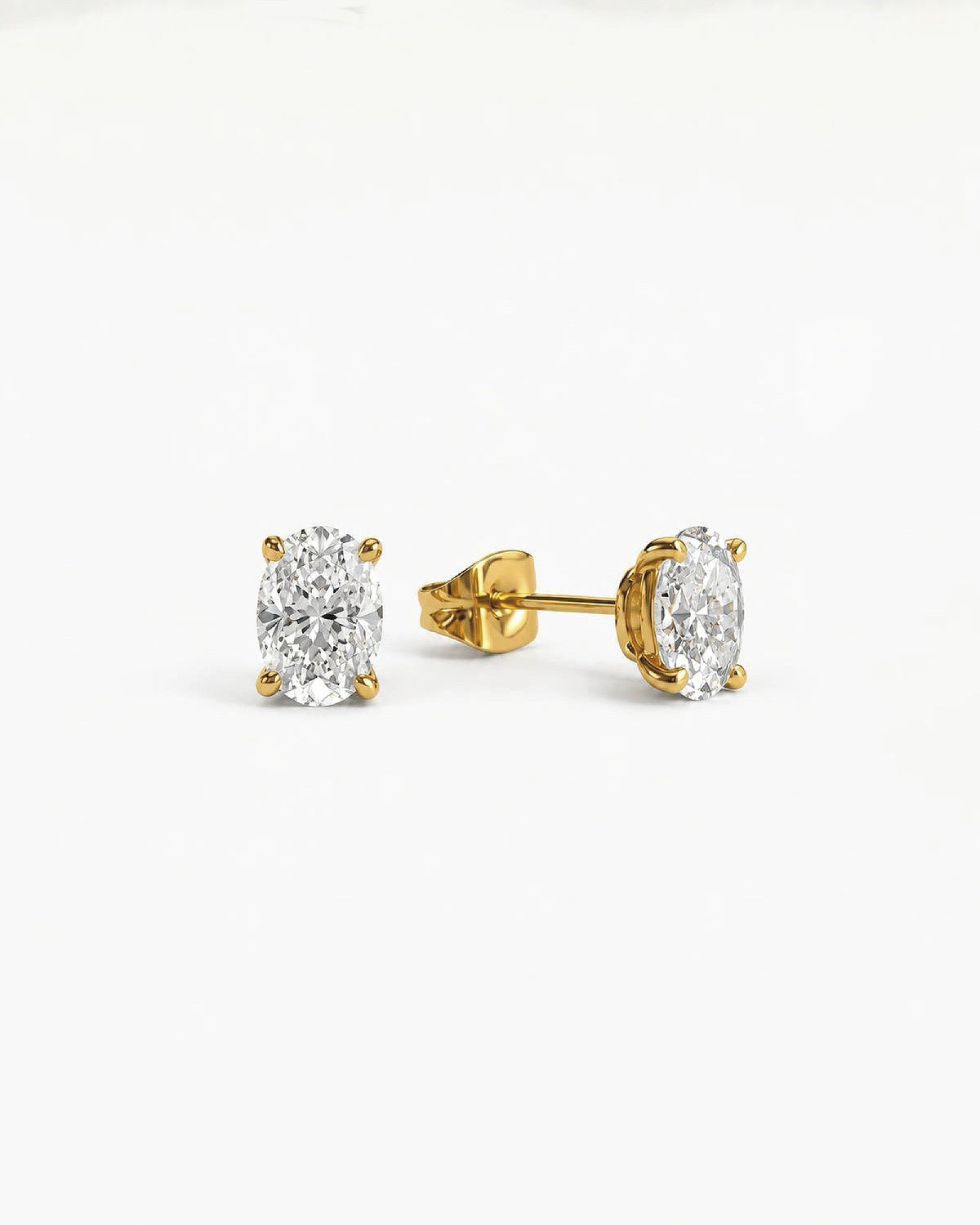 0.7ct oval lab grown diamond rhodium plated alloy studded earrings