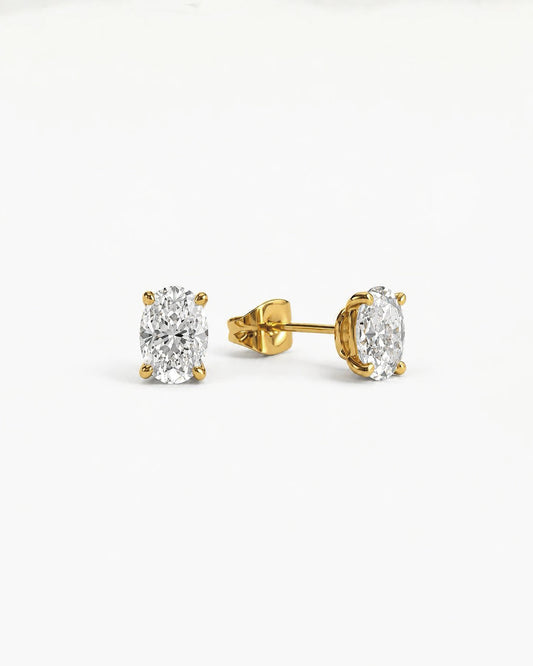 0.7ct oval lab grown diamond rhodium plated alloy studded earrings