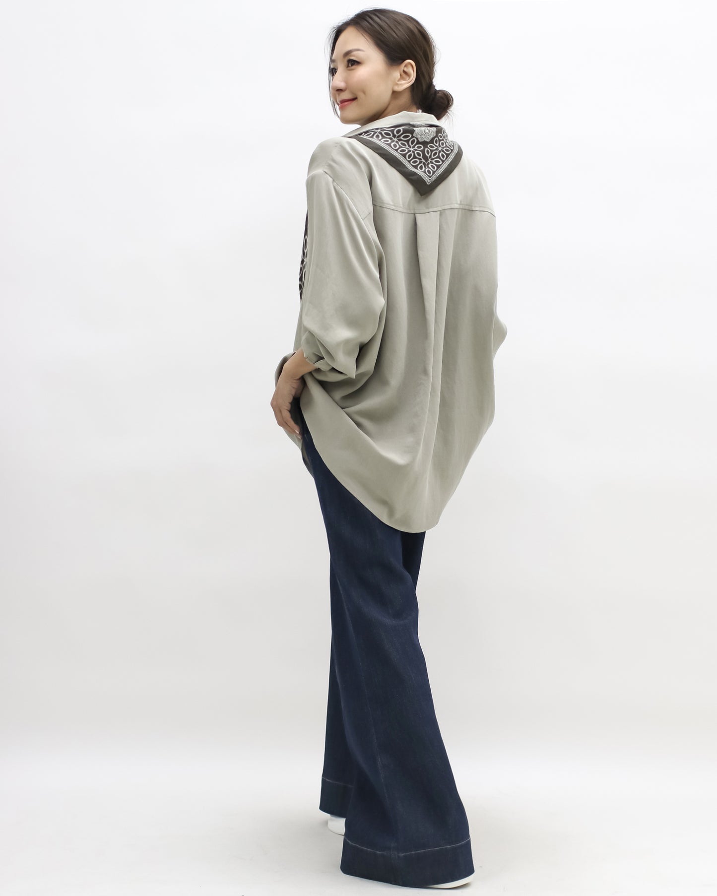 beige shirt w/ green printed scarf