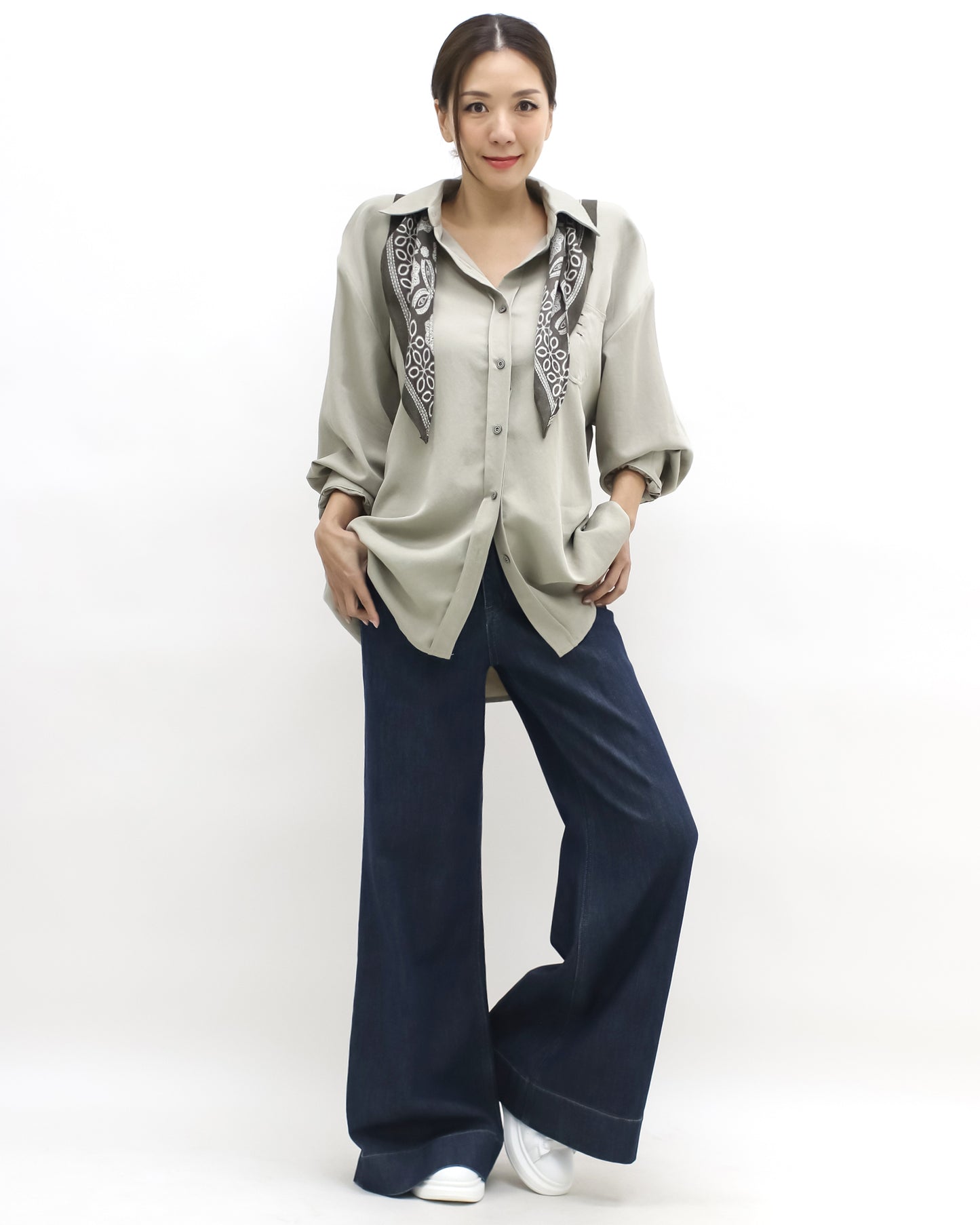 beige shirt w/ green printed scarf