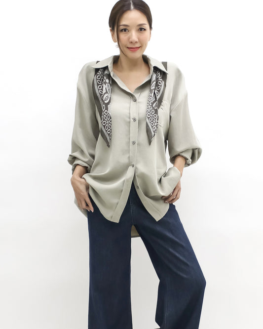 beige shirt w/ green printed scarf