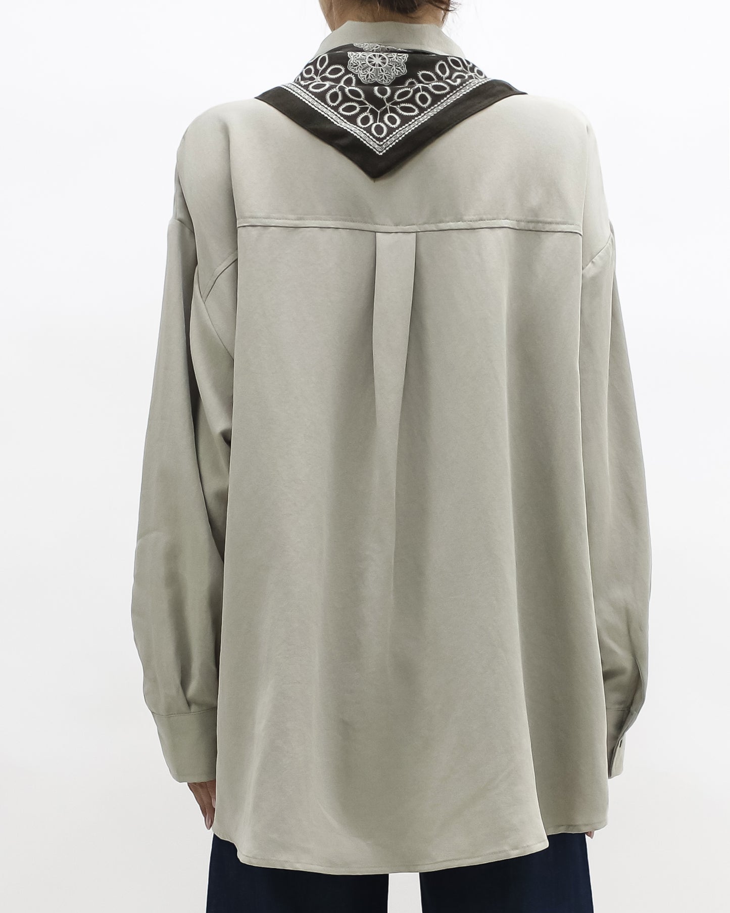 beige shirt w/ green printed scarf