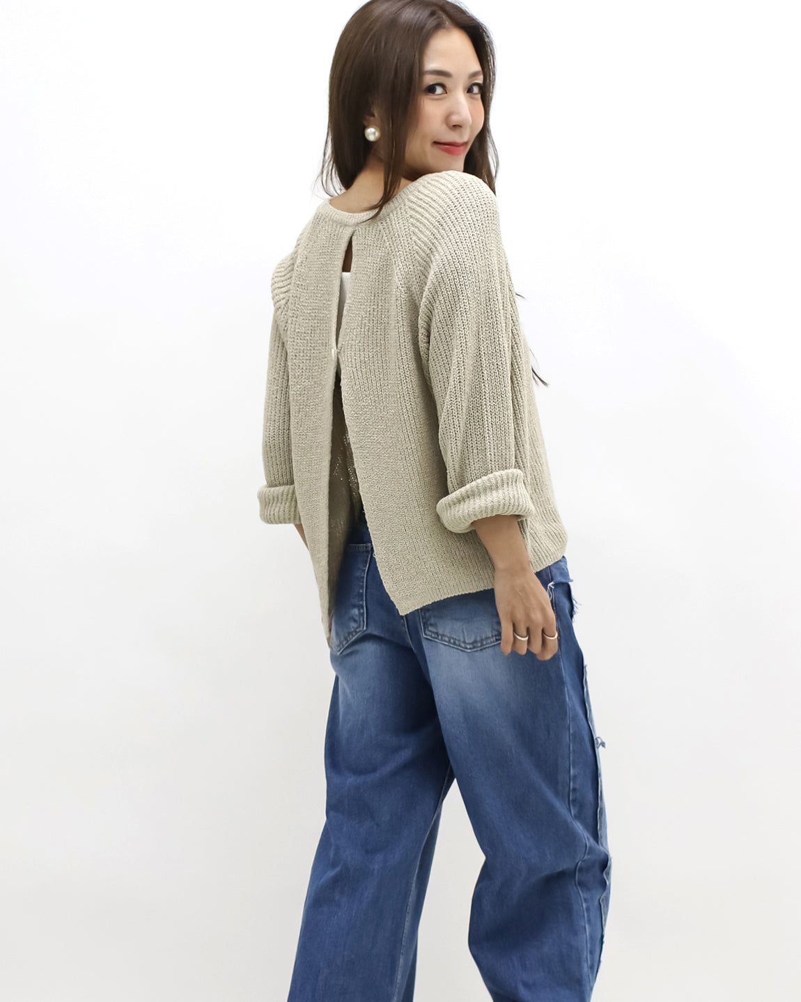 beige open back knitted top