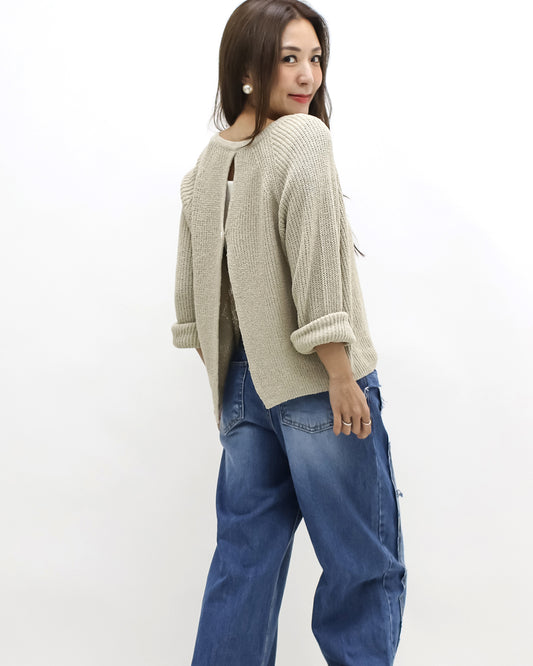 beige open back knitted top