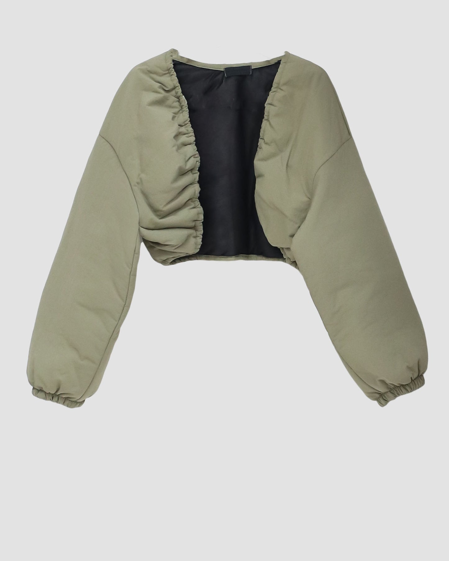 green padded arm warmer jacket