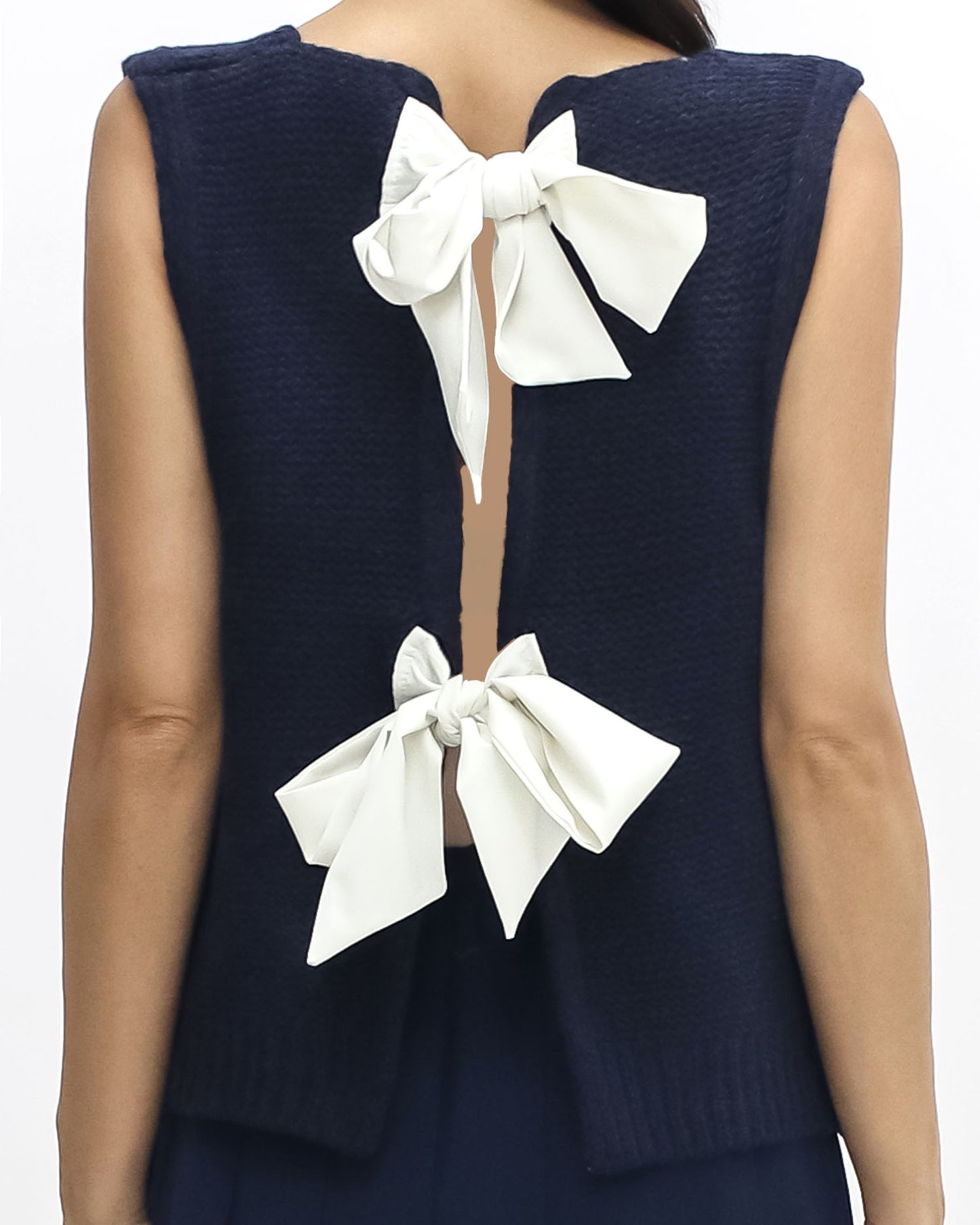 navy w/ ivory bows back knitted vest