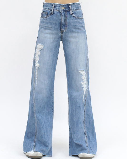 blue denim ripped flare jeans