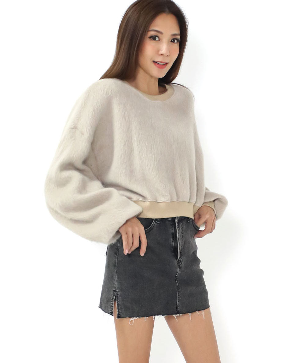 beige fluffy knitted sweatshirt