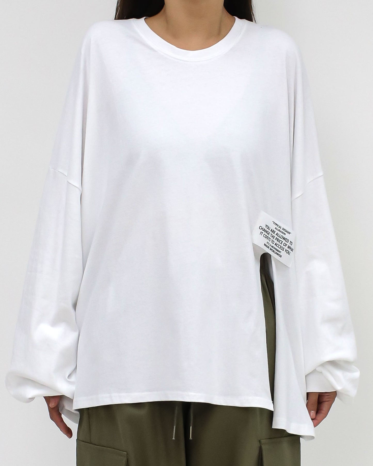 ivory split front w/ tag long sleeves tee