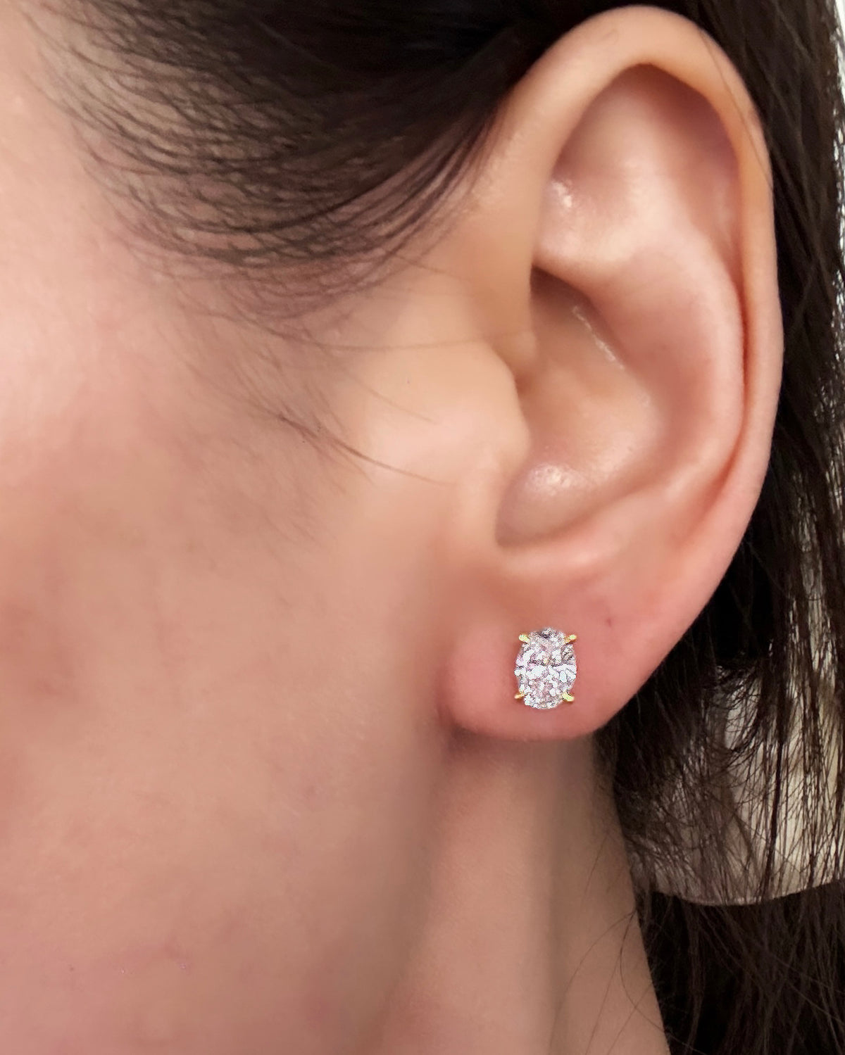 0.7ct oval lab grown diamond rhodium plated alloy studded earrings
