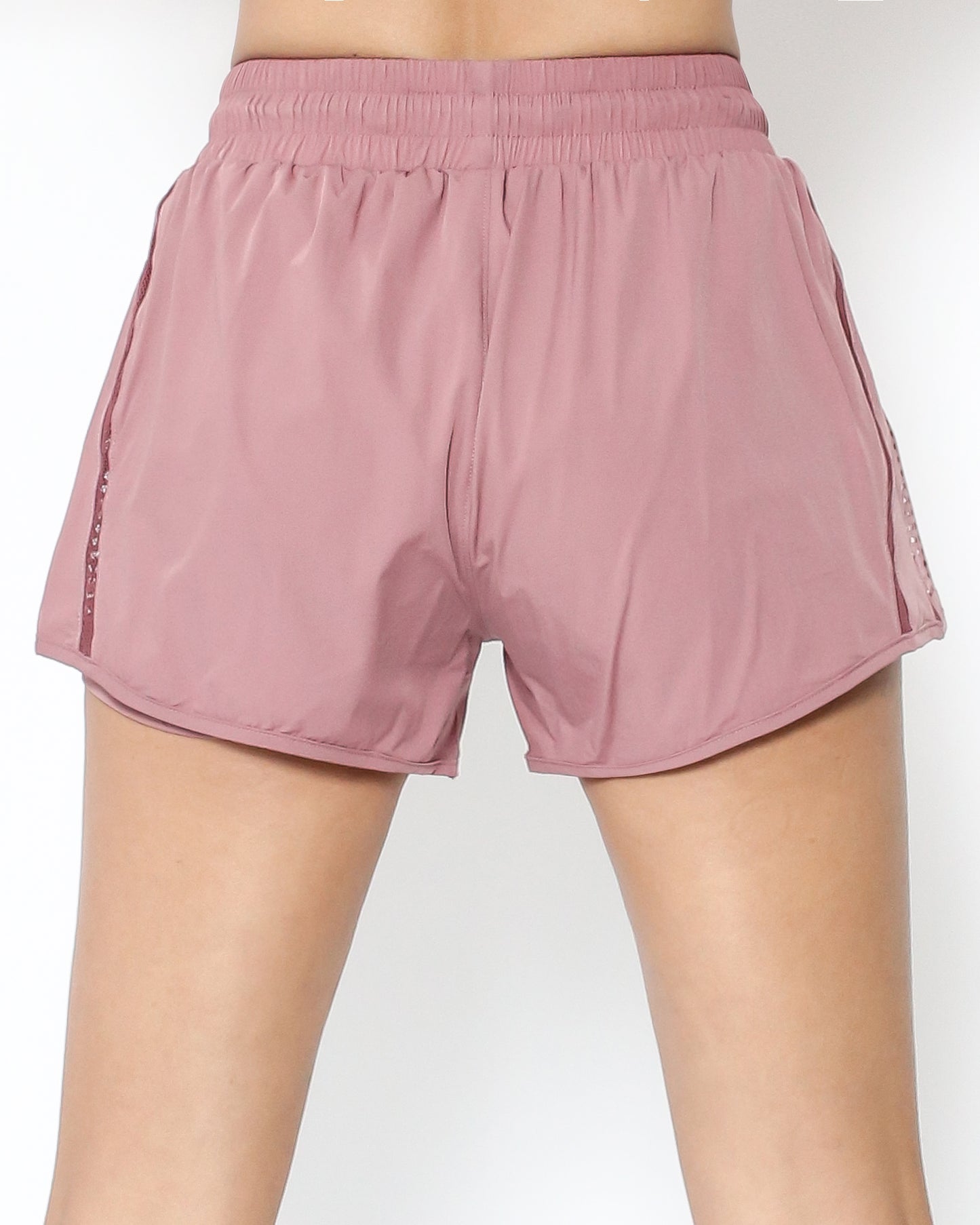 pink cage hem sports shorts