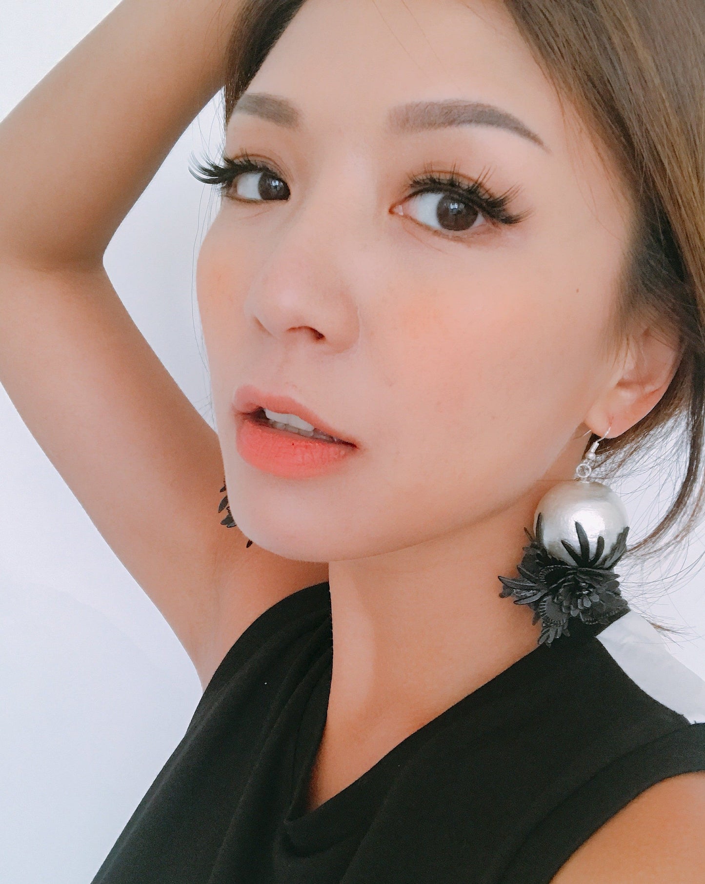 pearls w/ black leather flowers earrings