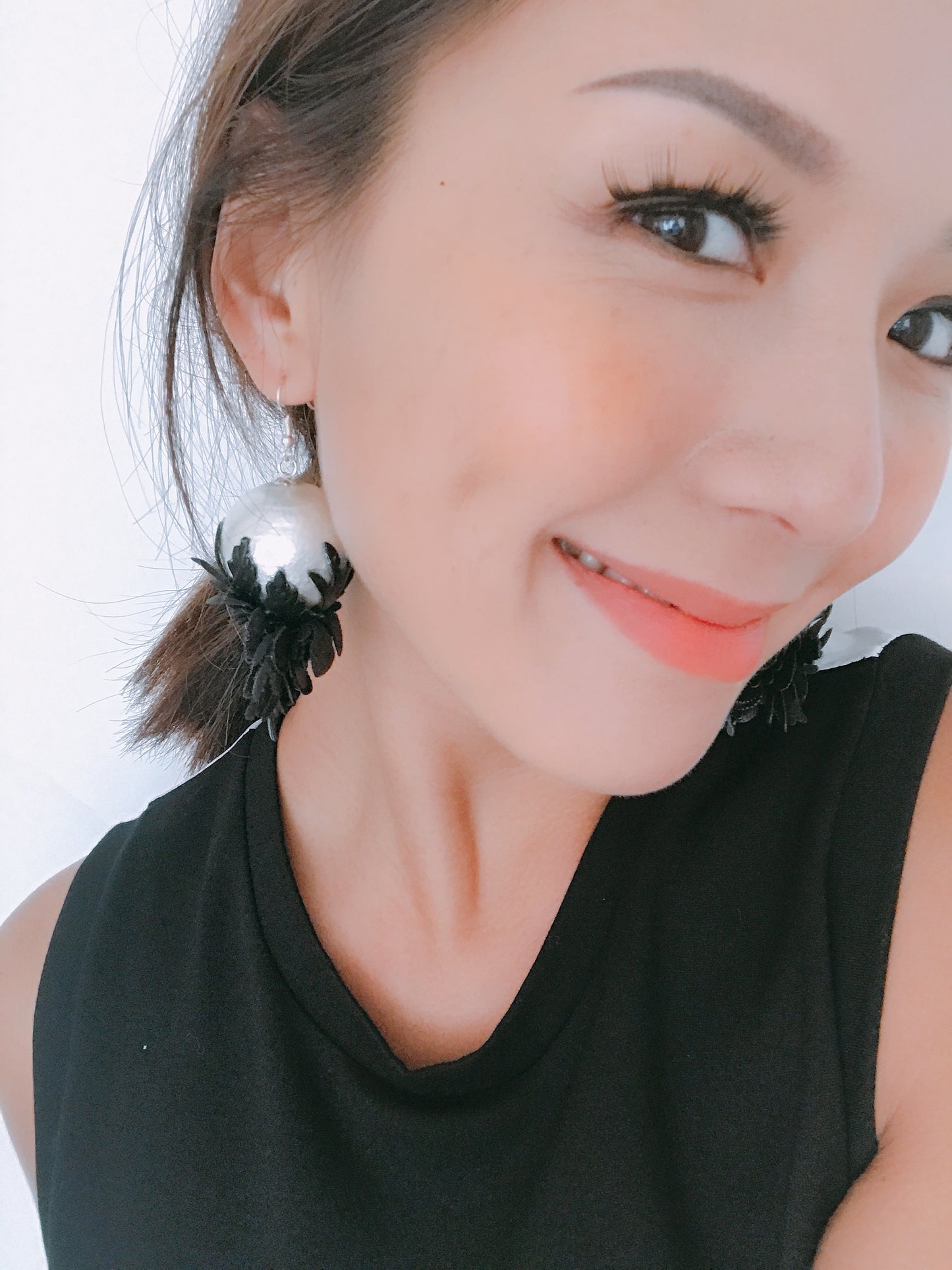 pearls w/ black leather flowers earrings