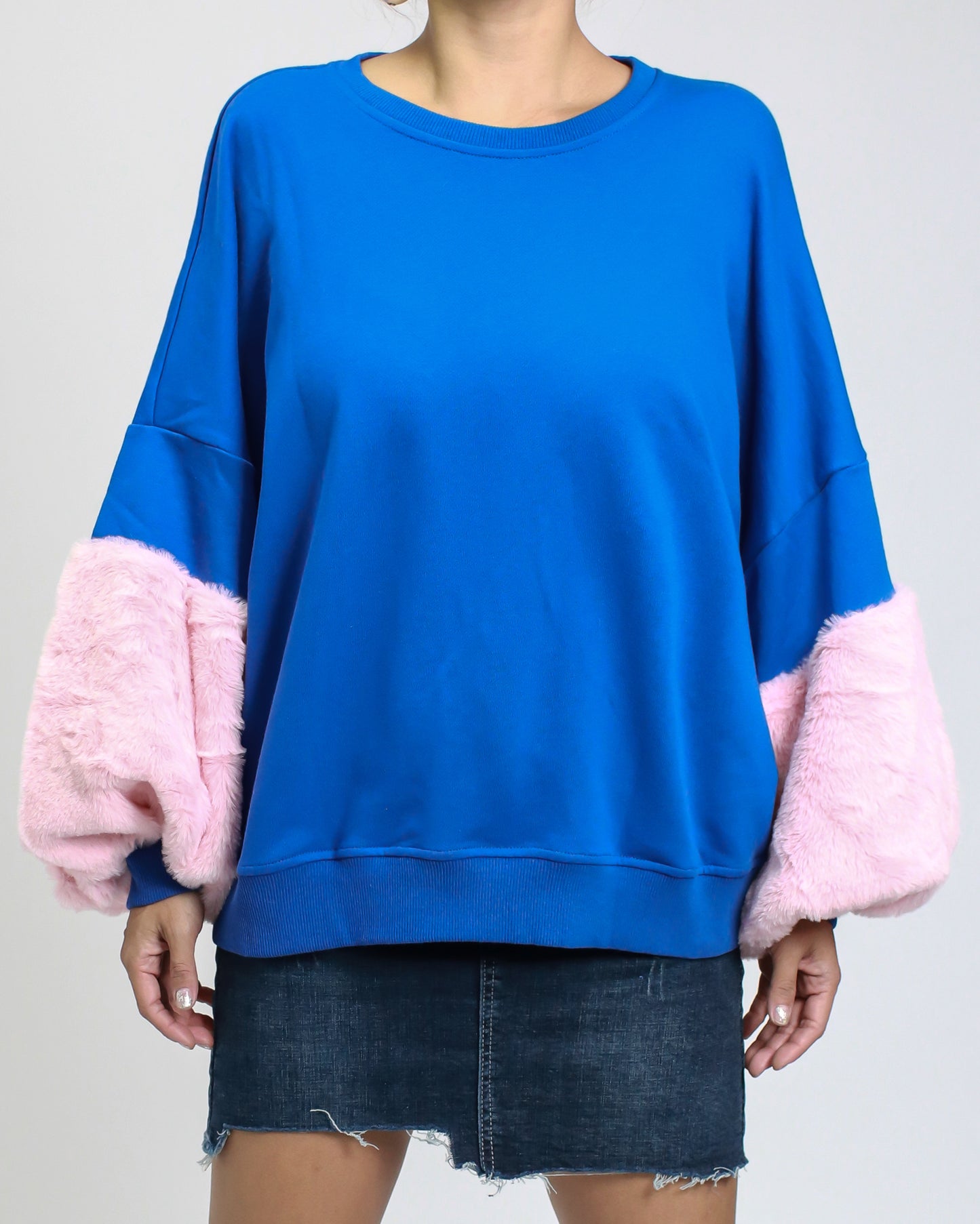 blue sweatshirt with pink furry sleeves
