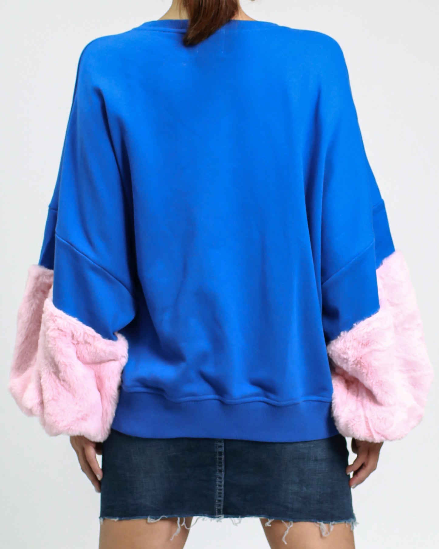 blue sweatshirt with pink furry sleeves